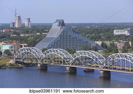 "Daugava River with the Railway Bridge or Dzelzceļa Tilts and the New National Library, view from the high-rise tower of the Academy of Sciences, Riga, Latvia, Europe" View Large Photo Image Stock Image - "Daugava River with the Railway Bridge or Dzelzceļa Tilts and the New National Library, view from the high-rise tower of the Academy of Sciences, Riga, Latvia, Europe". Fotosearch