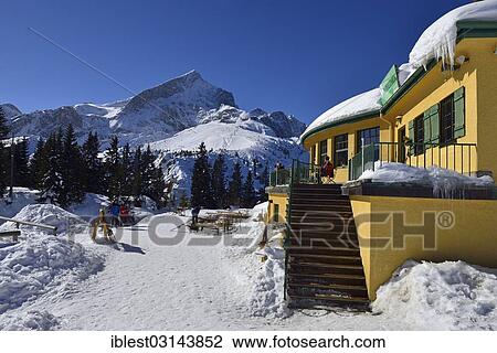 "DAV ski and mountain hut at Kreuzeck, Adolf Zoepptitz Haus, and skiarea below Alpspitze (2628 m), Wetterstein Mountains, Bavarian Alps, Werdenfelser Land, Upper Bavaria, Bavaria, Germany, Europe" View Large Photo Image Stock Image - "DAV ski and mountain hut at Kreuzeck, Adolf Zoepptitz Haus, and skiarea below Alpspitze (2628 m), Wetterstein Mountains, Bavarian Alps, Werdenfelser Land, Upper Bavaria, Bavaria, Germany, Europe". Fotosearch