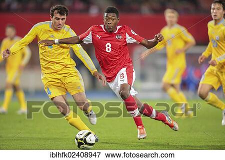 "David Alaba, #8 Austria, and Muktar Muktarov, #4 Kazakhstan, fight for the ball during the WC qualifier soccer game on October 16, 2012 in Vienna, Austria, Europe" View Large Photo Image Stock Photo - "David Alaba, #8 Austria, and Muktar Muktarov, #4 Kazakhstan, fight for the ball during the WC qualifier soccer game on October 16, 2012 in Vienna, Austria, Europe". Fotosearch
