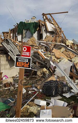 "Debris from destruction of a seaside community by Hurricane Sandy, one homeowner has posted """"no trespassing"""" signs around the rubble pile of his former home, Union Beach, New Jersey, United States, North America" View Large Photo Image Stock Image - "Debris from destruction of a seaside community by Hurricane Sandy, one homeowner has posted """"no trespassing"""" signs around the rubble pile of his former home, Union Beach, New Jersey, United States, North America". Fotosearch
