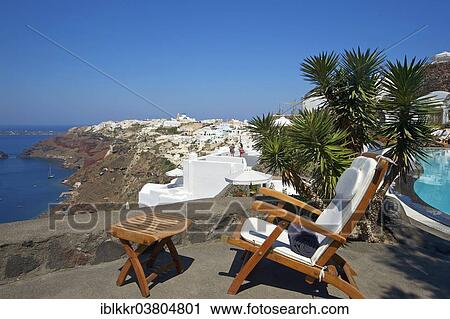"Deck chair on the terrace with sea view, Perivolas Hotel, Oia, Santorini, Cyclades, Greece, Europe" View Large Photo Image Stock Image - "Deck chair on the terrace with sea view, Perivolas Hotel, Oia, Santorini, Cyclades, Greece, Europe". Fotosearch