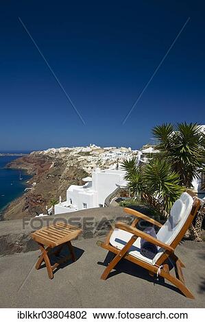 "Deck chair on the terrace with sea view, Perivolas Hotel, Oia, Santorini, Cyclades, Greece, Europe" View Large Photo Image Stock Image - "Deck chair on the terrace with sea view, Perivolas Hotel, Oia, Santorini, Cyclades, Greece, Europe". Fotosearch