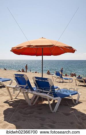 "Deck chairs and parasol at the beach, Calella de la Costa, Costa del Maresme, Catalonia, Spain, Europe, PublicGround, Europe" View Large Photo Image Stock Image - "Deck chairs and parasol at the beach, Calella de la Costa, Costa del Maresme, Catalonia, Spain, Europe, PublicGround, Europe". Fotosearch
