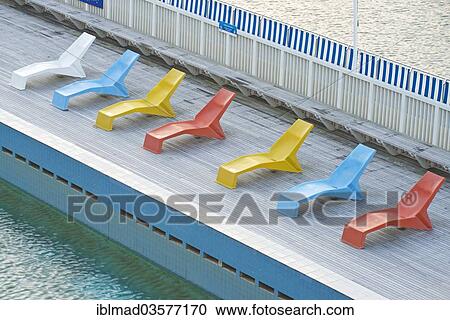 Stock Image - "Deckchairs beside the pool at Parnell Baths, Auckland, North Island, New Zealand, Oceania". Fotosearch