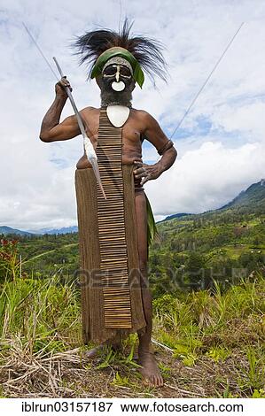 Stock Photo - "Decorated and painted tribal chief in the Highlands, Paya, Highland, Papua New Guinea, Oceania". Fotosearch