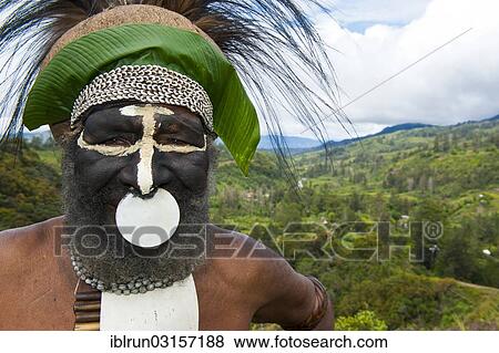 Stock Photo - "Decorated and painted tribal chief in the Highlands, Paya, Highland, Papua New Guinea, Oceania". Fotosearch