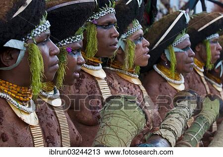 "Decorated and painted women celebrating the traditional Sing Sing in the highlands, Enga, Highlands, Papua New Guinea, Oceania" View Large Photo Image Stock Image - "Decorated and painted women celebrating the traditional Sing Sing in the highlands, Enga, Highlands, Papua New Guinea, Oceania". Fotosearch