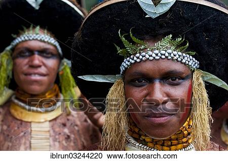 "Decorated and painted women celebrating the traditional Sing Sing in the highlands, Enga, Highlands, Papua New Guinea, Oceania" View Large Photo Image Stock Image - "Decorated and painted women celebrating the traditional Sing Sing in the highlands, Enga, Highlands, Papua New Guinea, Oceania". Fotosearch