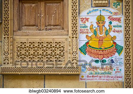 "Decorated sandstone facade with a window opening and an effigy of the Hindu deity Ganesha, the elephant-headed god, Jaisalmer, Rajasthan, India, Asia" View Large Photo Image Picture - "Decorated sandstone facade with a window opening and an effigy of the Hindu deity Ganesha, the elephant-headed god, Jaisalmer, Rajasthan, India, Asia". Fotosearch