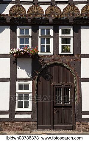 "Decorations on the facade of a half-timbered house, registrar's office, Hoxter, Weser Uplands, North Rhine-Westphalia, Germany, Europe" View Large Photo Image Stock Photo - "Decorations on the facade of a half-timbered house, registrar's office, Hoxter, Weser Uplands, North Rhine-Westphalia, Germany, Europe". Fotosearch