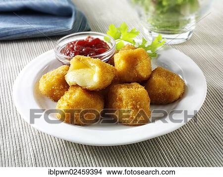Deep fried camembert in bread crumbs with salad View Large Photo Image Picture - Deep fried camembert in bread crumbs with salad. Fotosearch