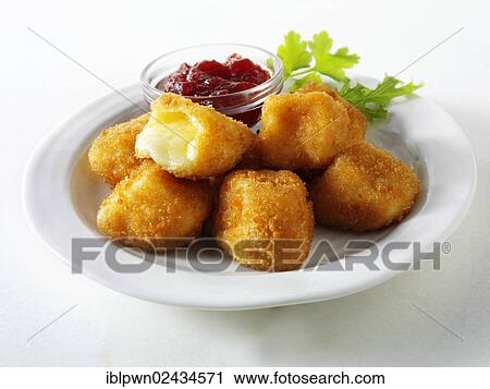 Deep fried camembert in bread crumbs with cranberry sauce View Large Photo Image Stock Image - Deep fried camembert in bread crumbs with cranberry sauce. Fotosearch