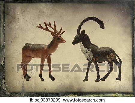 Deer and horned animal figurines View Large Photo Image Stock Photo - Deer and horned animal figurines. Fotosearch