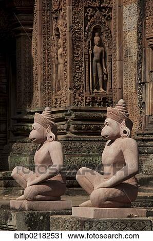 Stock Image - "Deity guardian sculptures in Khmer Hindu temple, Banteay Srei, Angkor, Siem Reap, Cambodia, Southeast Asia, Asia". Fotosearch