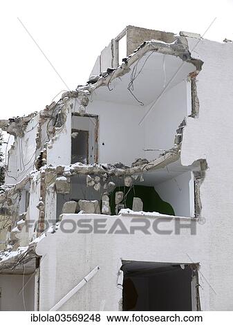Stock Photo - "Demolition of a residential building in winter, Wiesbaden, Hesse, Germany, Europe". Fotosearch