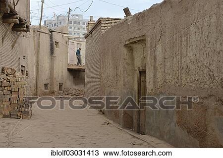 "Demolition of the old mudbrick houses in the Uyghur Muslim Quarter, historic town centre, destruction of the old city structure through a Chinese redevelopment program, Kashgar, Seidenstrasse, Xinjiang, China, People's Republic of China, Asia" View Large Photo Image Stock Image - "Demolition of the old mudbrick houses in the Uyghur Muslim Quarter, historic town centre, destruction of the old city structure through a Chinese redevelopment program, Kashgar, Seidenstrasse, Xinjiang, China, People's Republic of China, Asia". Fotosearch