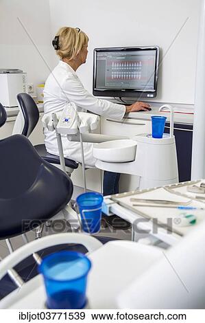 "Dental assistant entering a patient's data into the electronic medical record, Germany, Europe" View Large Photo Image Stock Photo - "Dental assistant entering a patient's data into the electronic medical record, Germany, Europe". Fotosearch