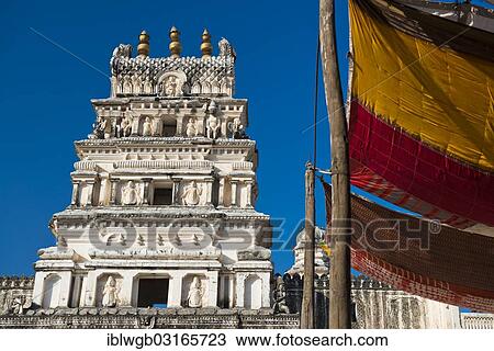 "Depiction of gods and figures in white marble on a shikhara tower of a Hindu temple, next to an awning made of coloured fabrics, Pushkar, Rajasthan, India, Asia" View Large Photo Image Stock Image - "Depiction of gods and figures in white marble on a shikhara tower of a Hindu temple, next to an awning made of coloured fabrics, Pushkar, Rajasthan, India, Asia". Fotosearch