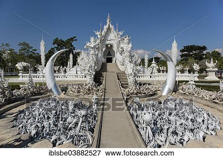 "Depiction of hell, pleading hands on the stairs to the entrance of Wat Rong Khun, White Temple, by architect Chalermchai Kositpipat, Chiang Rai, Chiang Rai Province, Northern Thailand, Thailand, Asia" View Large Photo Image Stock Photo - "Depiction of hell, pleading hands on the stairs to the entrance of Wat Rong Khun, White Temple, by architect Chalermchai Kositpipat, Chiang Rai, Chiang Rai Province, Northern Thailand, Thailand, Asia". Fotosearch