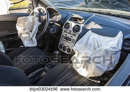 "Deployed airbags in a car after a traffic accident, Germany, Europe" View Large Photo Image Stock Photograph - "Deployed airbags in a car after a traffic accident, Germany, Europe". Fotosearch