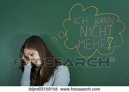 "Depressed looking teacher standing in front of the blackboard with a speech bubble, """"Ich kann nicht mehr"""", German for """"I can't take anymore"""", symbolic image for burnout among teachers, Germany, Europe" View Large Photo Image Stock Photography - "Depressed looking teacher standing in front of the blackboard with a speech bubble, """"Ich kann nicht mehr"""", German for """"I can't take anymore"""", symbolic image for burnout among teachers, Germany, Europe". Fotosearch