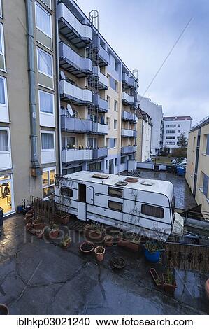"Depressing rear courtyard with caravans and flower pots, Munchen, Munich, Upper Bavaria, Bavaria, Germany, Europe" View Large Photo Image Stock Image - "Depressing rear courtyard with caravans and flower pots, Munchen, Munich, Upper Bavaria, Bavaria, Germany, Europe". Fotosearch