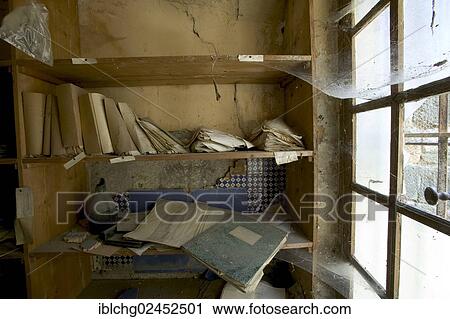 Stock Image - "Derelict shelf, Municipal Archives, Puy de Dome, Auvergne, France, Europe". Fotosearch