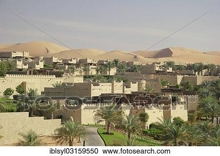 "Desert luxury hotel Anantara Qasr Al Sarab, hotel resort built in the style of a desert fort, surrounded by high sand dunes in the Empty Quarter or the sand desert of Rub Al Khali, Rub al Khali, Emirate of Abu Dhabi, United Arab Emirates, Asia" View Large Photo Image Stock Image - "Desert luxury hotel Anantara Qasr Al Sarab, hotel resort built in the style of a desert fort, surrounded by high sand dunes in the Empty Quarter or the sand desert of Rub Al Khali, Rub al Khali, Emirate of Abu Dhabi, United Arab Emirates, Asia". Fotosearch