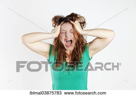 Desperate young woman screaming View Large Photo Image Stock Image - Desperate young woman screaming. Fotosearch