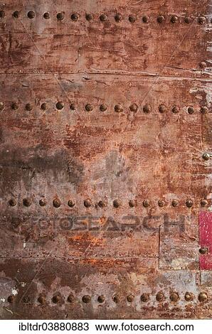 Stock Image - "Detail of a rusty gate with iron spikes, Malaga province, Andalusia, Spain, Europe". Fotosearch
