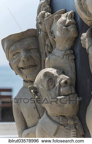 Stock Photograph - "Detail, the """"Magic Pillar"""" by Peter Lenk on the pier, Meersburg, Baden-Wurttemberg, Germany, Europe". Fotosearch