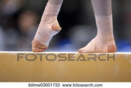 Stock Image - "Detail view of a bandaged foot, balance beam, EnBW Gymnastics World Cup 2012, Porsche-Arena, Stuttgart, Baden-Wurttemberg, Germany, Europe". Fotosearch