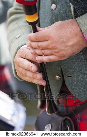 "Detail view of the hands of a Scottish piper playing the bagpipes, Hesse, Germany, Europe" View Large Photo Image Stock Image - "Detail view of the hands of a Scottish piper playing the bagpipes, Hesse, Germany, Europe". Fotosearch