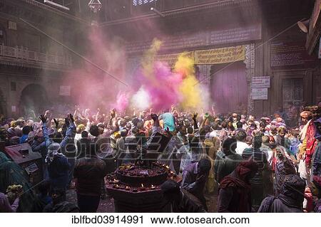 "Devotees celebrating and throwing coloured powder, Holi festival, Banke Bihari Temple, Vrindavan, Uttar Pradesh, India, Asia" View Large Photo Image Stock Image - "Devotees celebrating and throwing coloured powder, Holi festival, Banke Bihari Temple, Vrindavan, Uttar Pradesh, India, Asia". Fotosearch