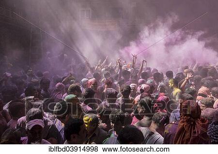 "Devotees celebrating and throwing coloured powder, Holi festival, Banke Bihari Temple, Vrindavan, Uttar Pradesh, India, Asia" View Large Photo Image Stock Photo - "Devotees celebrating and throwing coloured powder, Holi festival, Banke Bihari Temple, Vrindavan, Uttar Pradesh, India, Asia". Fotosearch