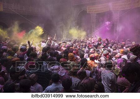 "Devotees celebrating and throwing coloured powder, Holi festival, Banke Bihari Temple, Vrindavan, Uttar Pradesh, India, Asia" View Large Photo Image Stock Photo - "Devotees celebrating and throwing coloured powder, Holi festival, Banke Bihari Temple, Vrindavan, Uttar Pradesh, India, Asia". Fotosearch