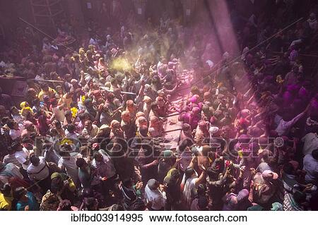 "Devotees celebrating and throwing coloured powder, Holi festival, Banke Bihari Temple, Vrindavan, Uttar Pradesh, India, Asia" View Large Photo Image Stock Photography - "Devotees celebrating and throwing coloured powder, Holi festival, Banke Bihari Temple, Vrindavan, Uttar Pradesh, India, Asia". Fotosearch