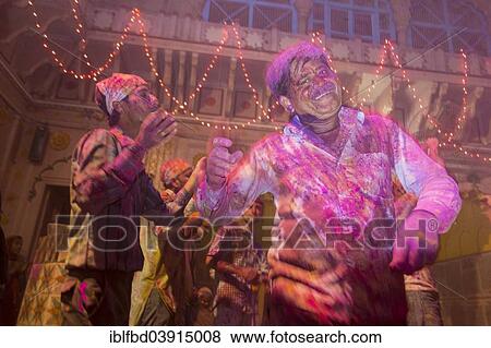 "Devotees covered in coloured powder celebrating, Holi festival, Banke Bihari Temple, Vrindavan, Uttar Pradesh, India, Asia" View Large Photo Image Stock Photo - "Devotees covered in coloured powder celebrating, Holi festival, Banke Bihari Temple, Vrindavan, Uttar Pradesh, India, Asia". Fotosearch