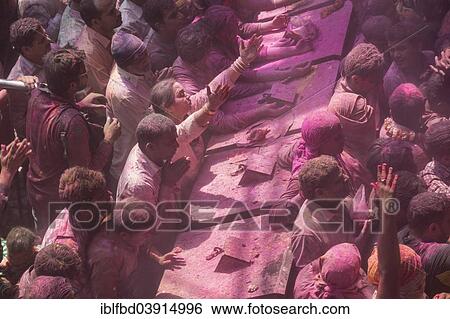 "Devotees covered in coloured powder praying, Holi festival, Banke Bihari Temple, Vrindavan, Uttar Pradesh, India, Asia" View Large Photo Image Stock Photograph - "Devotees covered in coloured powder praying, Holi festival, Banke Bihari Temple, Vrindavan, Uttar Pradesh, India, Asia". Fotosearch