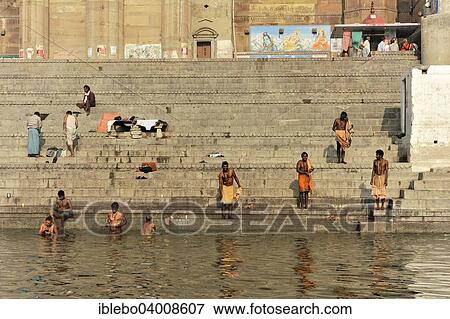 "Devotees in ritual ablutions on the banks of the Ganges, Varanasi, Benares, Uttar Pradesh, India, Asia" View Large Photo Image Stock Photo - "Devotees in ritual ablutions on the banks of the Ganges, Varanasi, Benares, Uttar Pradesh, India, Asia". Fotosearch