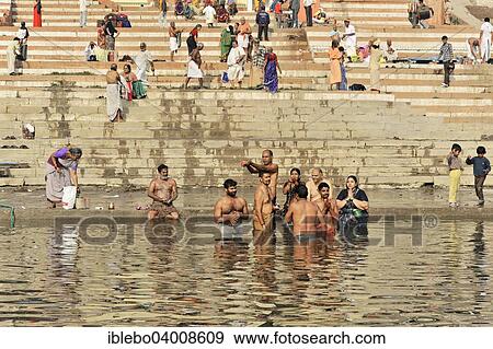 "Devotees in ritual ablutions on the banks of the Ganges, Varanasi, Benares, Uttar Pradesh, India, Asia" View Large Photo Image Stock Photo - "Devotees in ritual ablutions on the banks of the Ganges, Varanasi, Benares, Uttar Pradesh, India, Asia". Fotosearch
