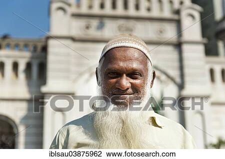 Stock Image - "Devout Muslim with cap and long white beard, Al-Akbar Mosque, Colombo, Sri Lanka, Asia". Fotosearch