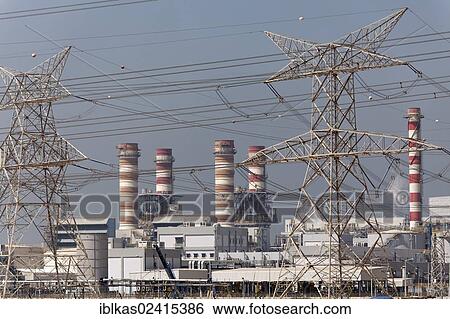 DEWA Power Station, electricity transmission pylons, Nakheel Harbour, Dubai, United Arab Emirates, Middle East, Asia View Large Photo Image Stock Photograph - DEWA Power Station, electricity transmission pylons, Nakheel Harbour, Dubai, United Arab Emirates, Middle East, Asia. Fotosearch