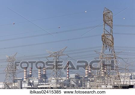 DEWA Power Station, electricity transmission pylons, Nakheel Harbour, Dubai, United Arab Emirates, Middle East, Asia View Large Photo Image Stock Photography - DEWA Power Station, electricity transmission pylons, Nakheel Harbour, Dubai, United Arab Emirates, Middle East, Asia. Fotosearch