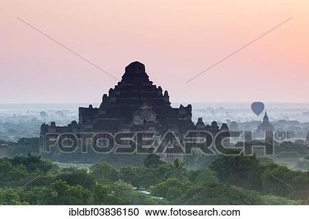 "Dhammayangyi Temple, stupa, pagoda, temple complex, in the morning fog, hot air balloon, Plateau of Bagan, Mandalay Division, Burma or Myanmar" View Large Photo Image Stock Image - "Dhammayangyi Temple, stupa, pagoda, temple complex, in the morning fog, hot air balloon, Plateau of Bagan, Mandalay Division, Burma or Myanmar". Fotosearch