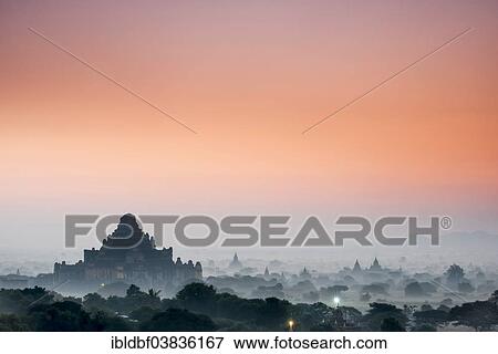 "Dhammayangyi Temple, stupa, pagoda, temple complex, in the morning fog, sunrise, Plateau of Bagan, Mandalay Division, Burma or Myanmar" View Large Photo Image Stock Photo - "Dhammayangyi Temple, stupa, pagoda, temple complex, in the morning fog, sunrise, Plateau of Bagan, Mandalay Division, Burma or Myanmar". Fotosearch