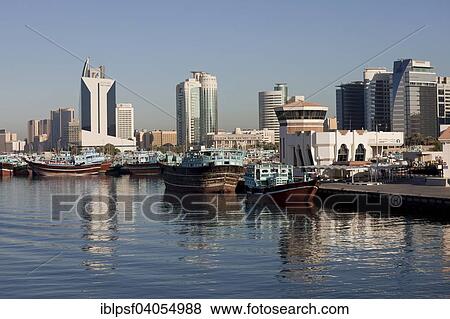 "Dhow harbor and skyscrapers on the Creek, Dubai, Emirate of Dubai, United Arab Emirates, Asia" View Large Photo Image Stock Photo - "Dhow harbor and skyscrapers on the Creek, Dubai, Emirate of Dubai, United Arab Emirates, Asia". Fotosearch