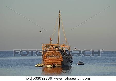 Stock Photo - "Dhow in the harbor, Muttrah, Muscat Governorate (Capital Area, Oman, Asia". Fotosearch