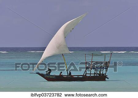 "Dhow sailing on turquoise waters, Dongwe, Zanzibar, Tanzania, Africa" View Large Photo Image Stock Image - "Dhow sailing on turquoise waters, Dongwe, Zanzibar, Tanzania, Africa". Fotosearch