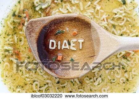"Diaet"""", German for """"diet"""", written with pasta letters on a wooden spoon, Germany, Europe" View Large Photo Image Stock Image - "Diaet"""", German for """"diet"""", written with pasta letters on a wooden spoon, Germany, Europe". Fotosearch